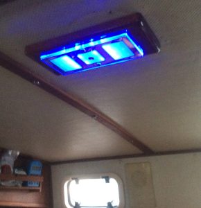 One option with LED lights is a night-vision-saving blue (or red) mode which is great for overnight passages.