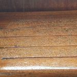 crushed walnut shells embedded in varnish