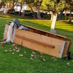 A ghoul climbs out of his coffin